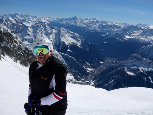 Jeff R. can't contain his enthusiasm on a bluebird day 3 years ago in Courmie. Come see for yourself how awesome Mt. Blanc truly is.