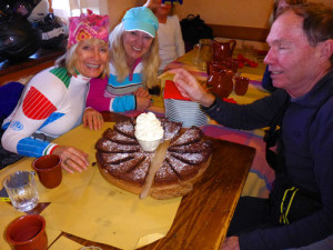 Yumm! Ellie, Ruby, and Jim digging in to dessert in an on-slope lunch. The food in Italy?? Fagetaboutit!